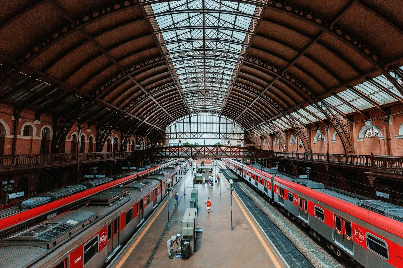 Several trains in a large railway station